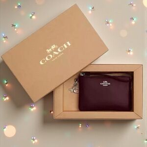 Coach Deep Red/Burgundy Soft Leather Wristlet with Silver Accents. NIB.